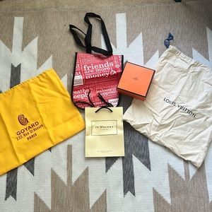 Various designer dust bags and boxes